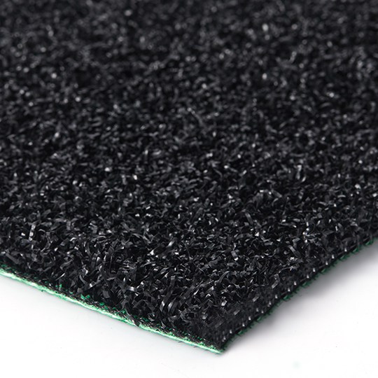 Edge detail of dense black Hyrox turf sample