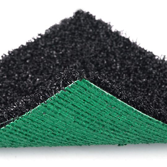 Hyrox turf sample showing black pile and green backing