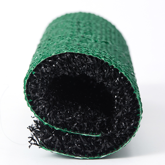 Rolled Hyrox turf showing green backing and black pile