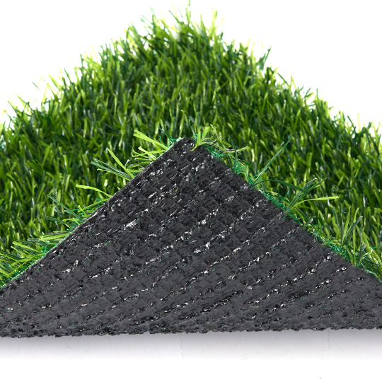 Turf sample corner folded back to show dark backing beneath the fibers